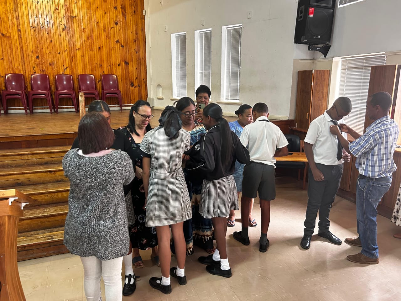 Parents putting on prefects ties